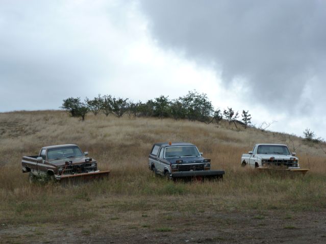 snowplows waiting for winter